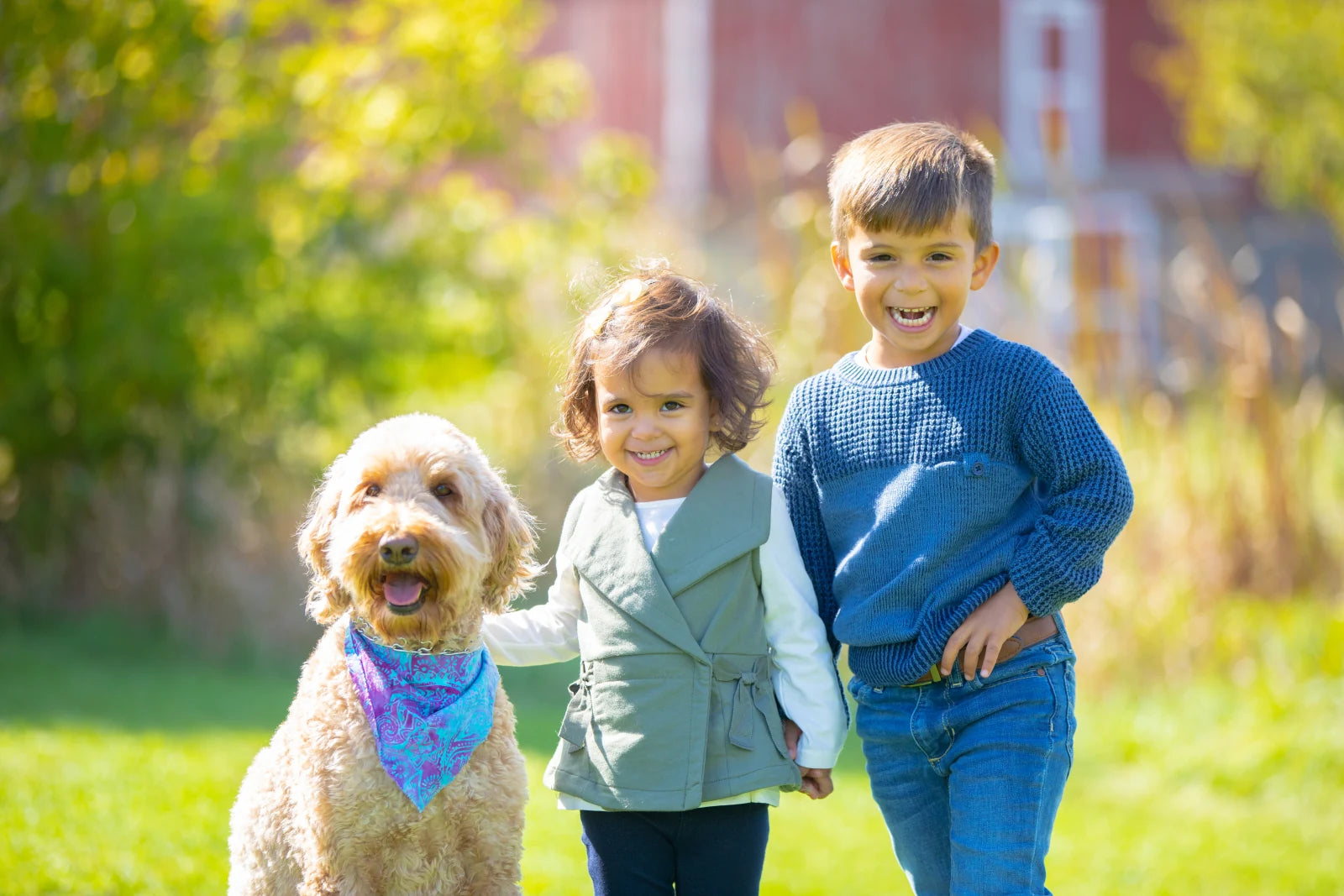 Bianca with two children from the Googipet family outdoors